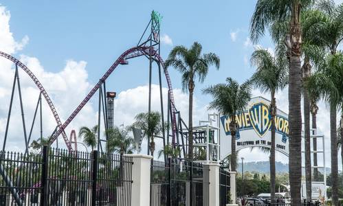 Village Roadshow has sold their Gold Coast land but the theme parks are staying put